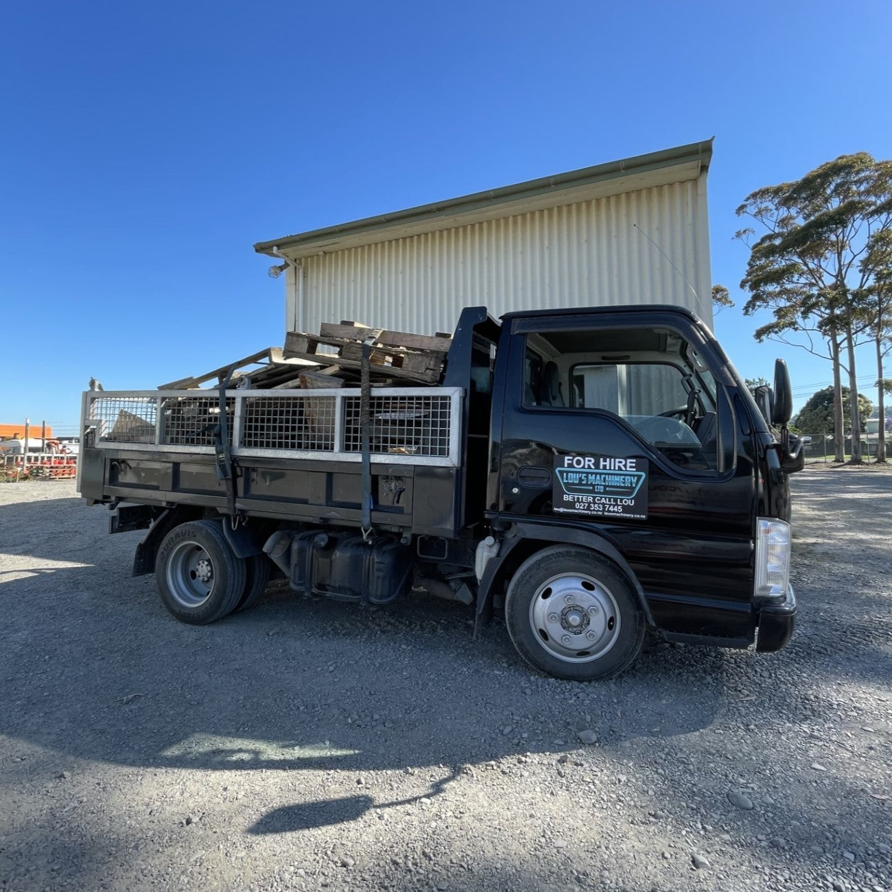 Isuzu Elf Caged Tipper Truck - Automatic